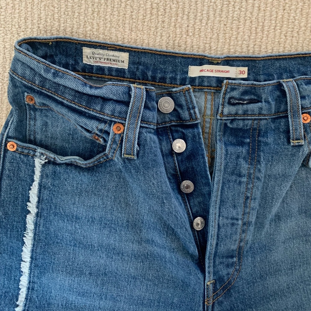 Levi’s ribcage ankle fringe jeans!!